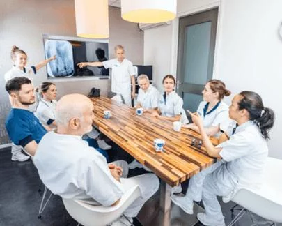 Dental team receiving professional coaching